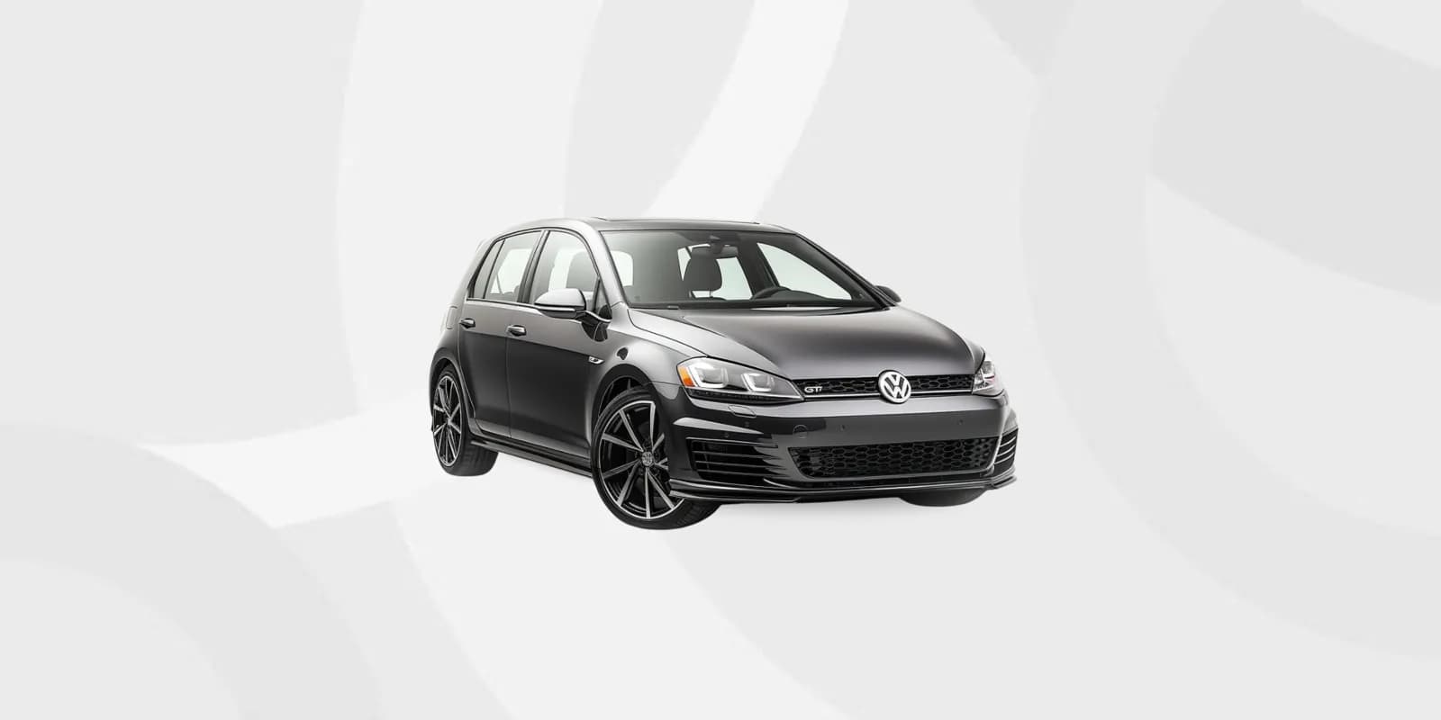 Citadine Volkswagen Golf noire, vue de trois quarts avant